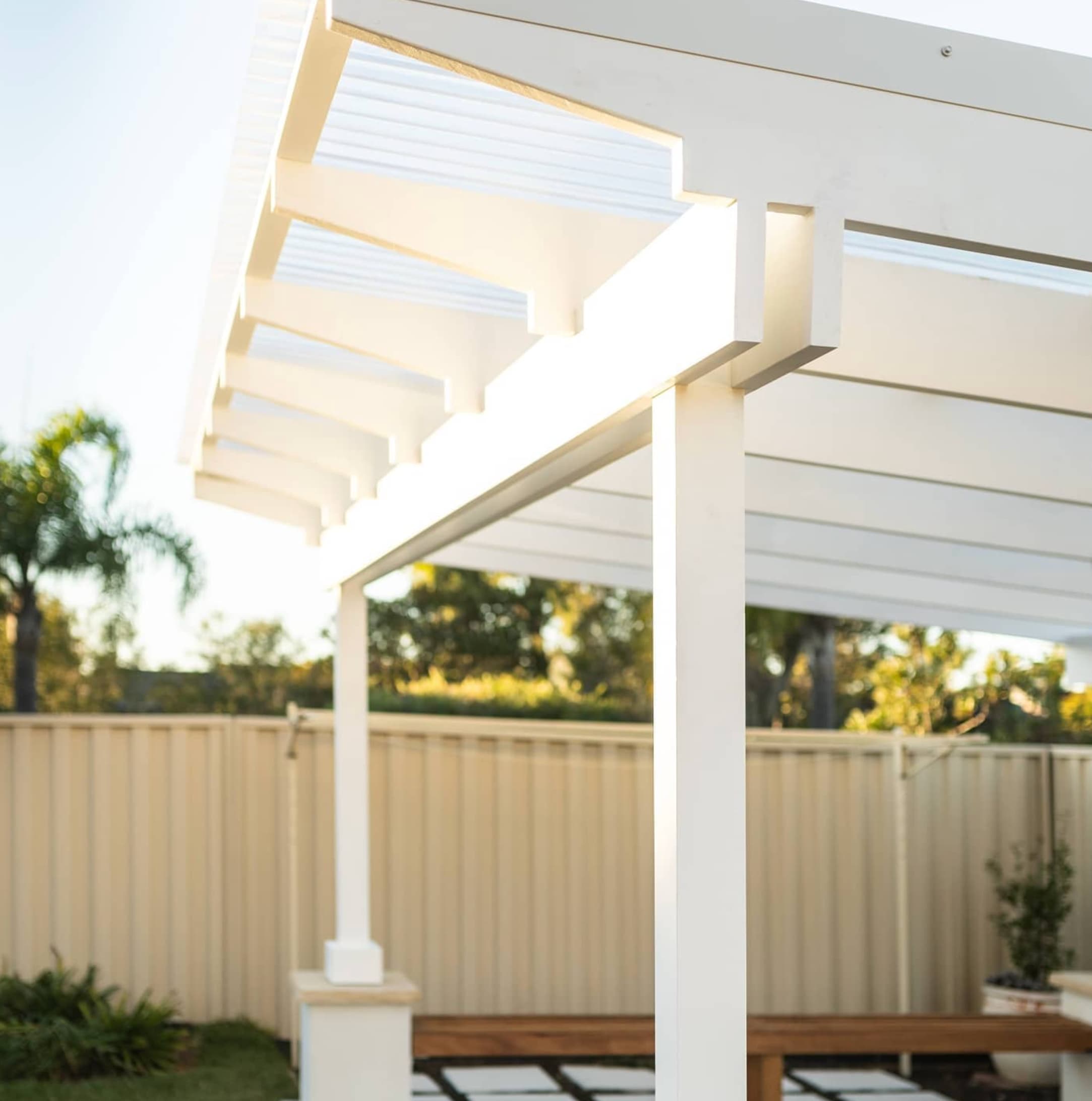 Bangor pergola — painted pine structure and hardwood bench seat detail
