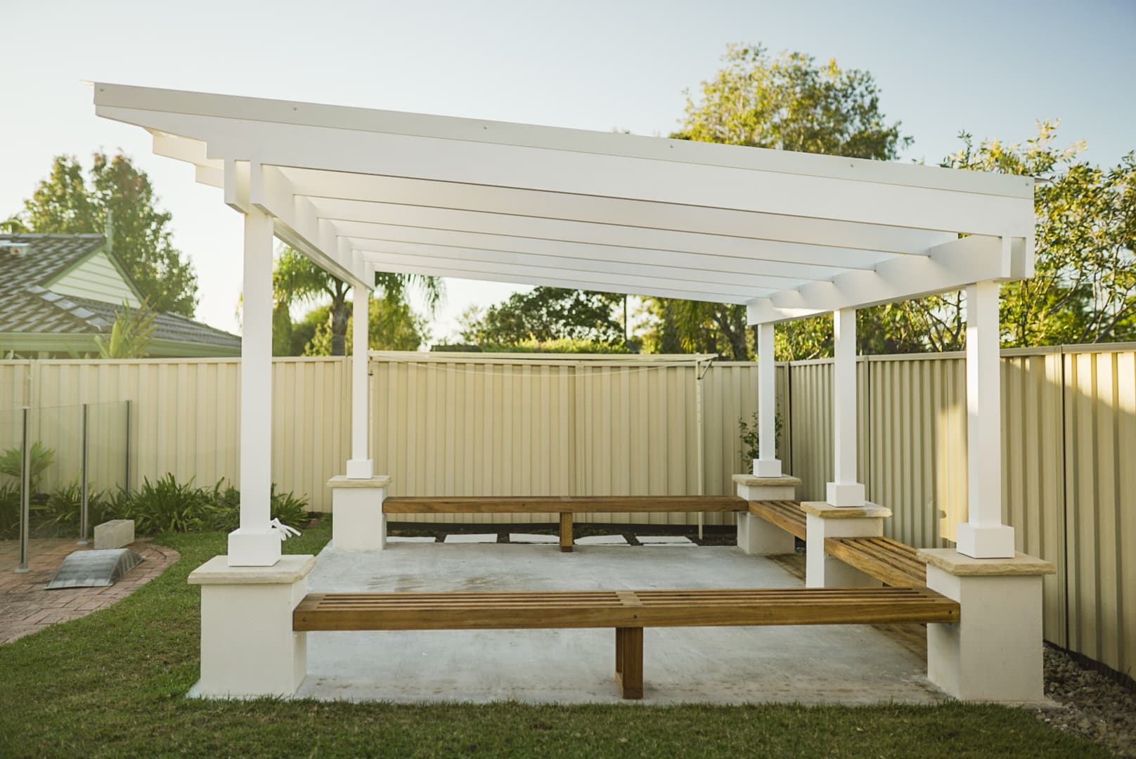 Custom timber pergola with built-in bench seats Bangor VIKING Design Build