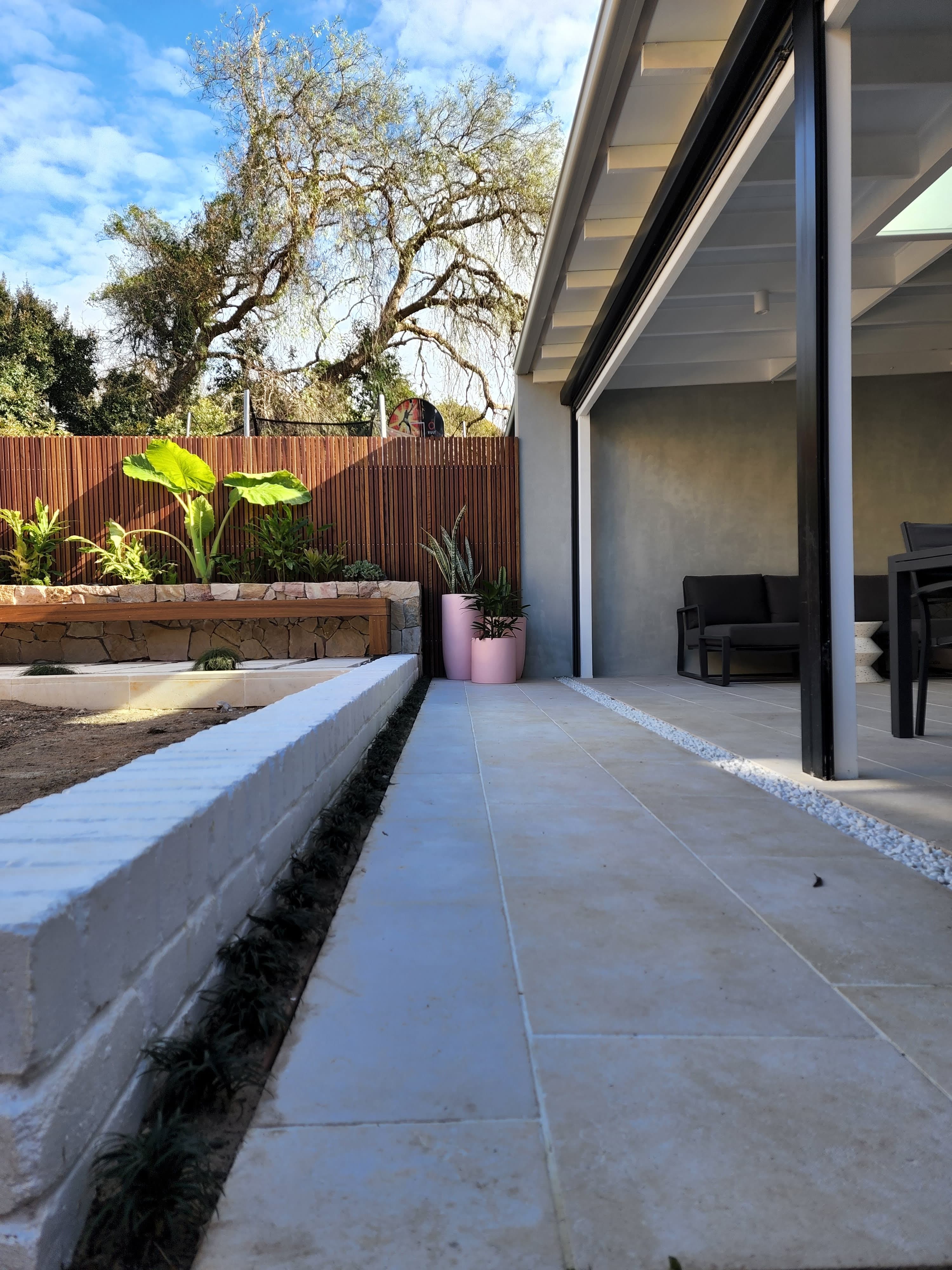 Como — limestone paving and stone retaining walls