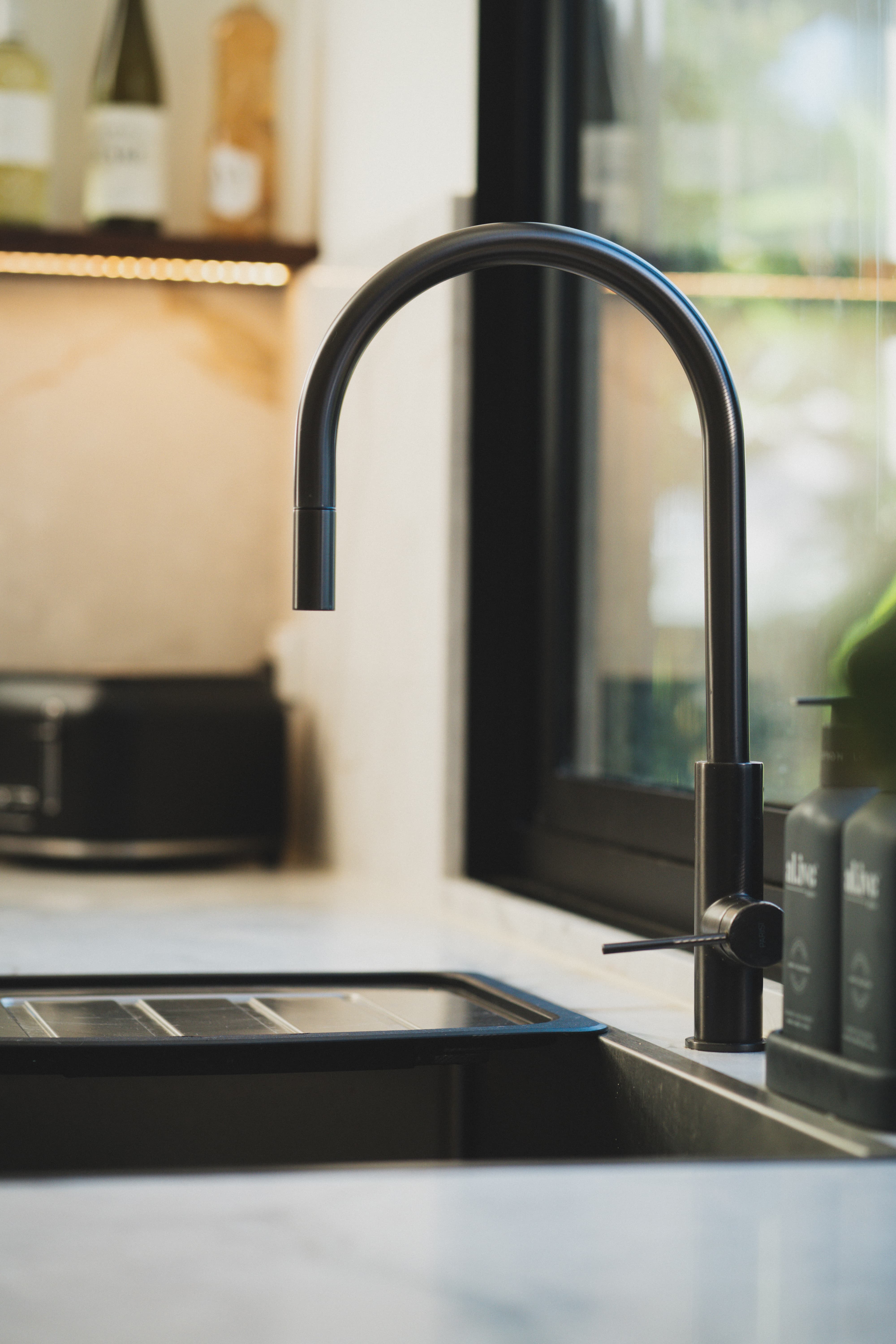 Tarrawanna kitchen — matte black tapware detail