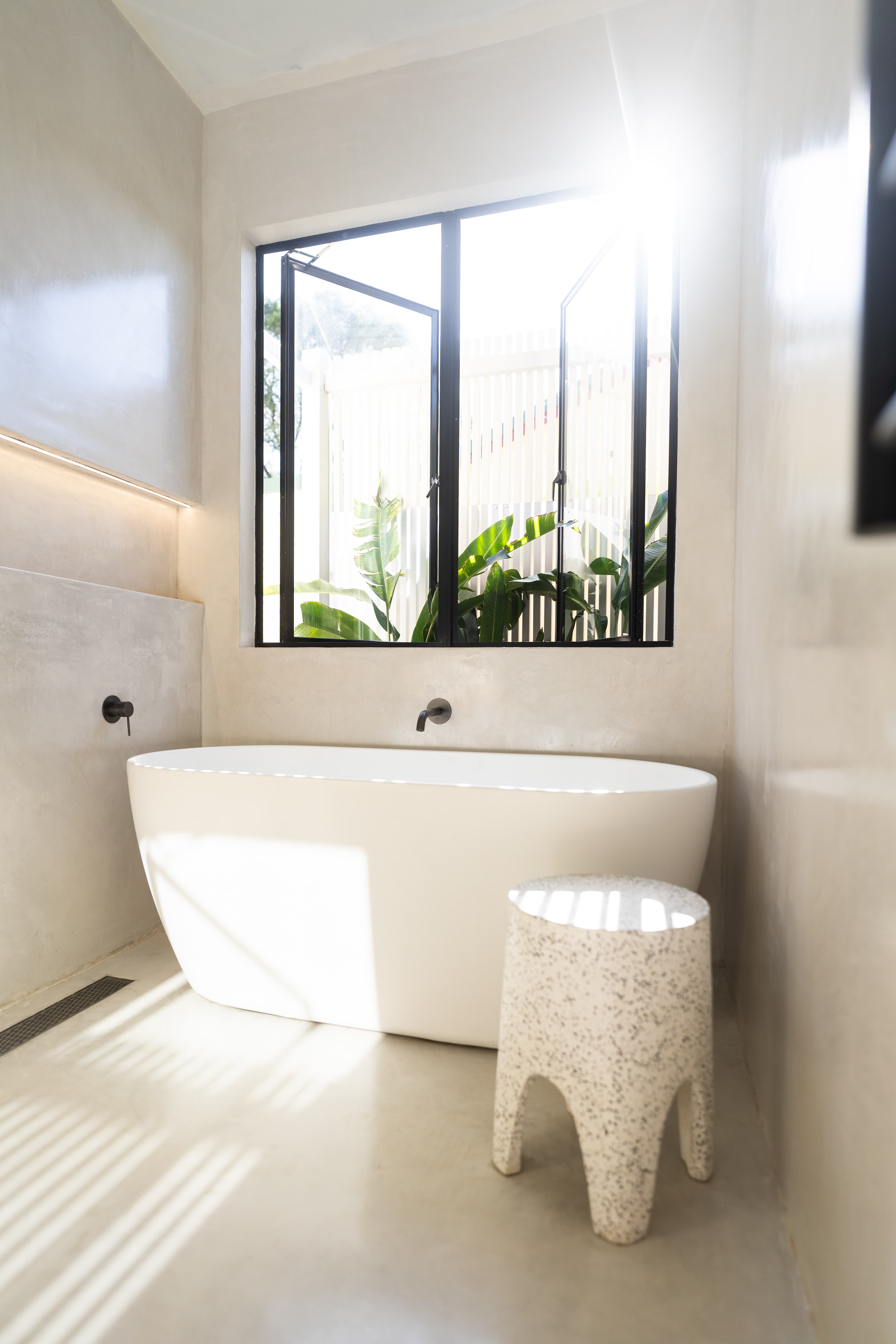 Microcement freestanding bath renovation Tarrawanna Wollongong